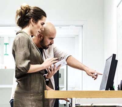 Business Workers Using Desktop Computer